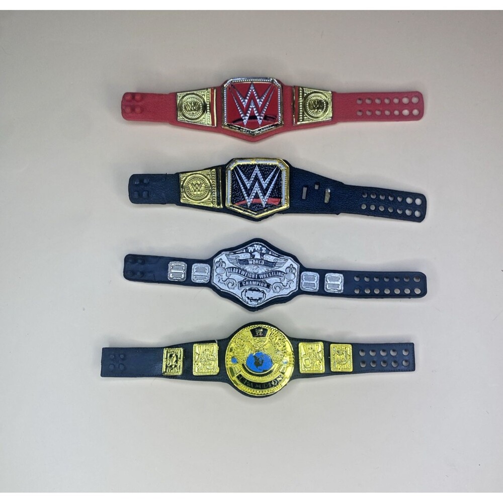 WWE Action Figures Championship Belts Lot of 4 - Universal, Winged Eagle, WHC
